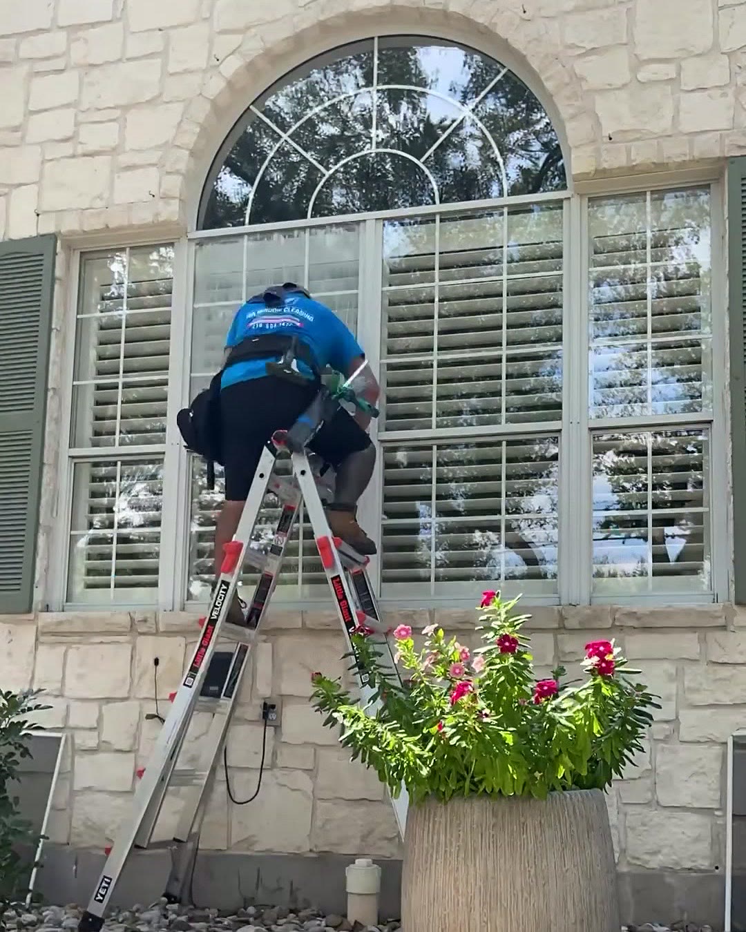 Arched window, stone home