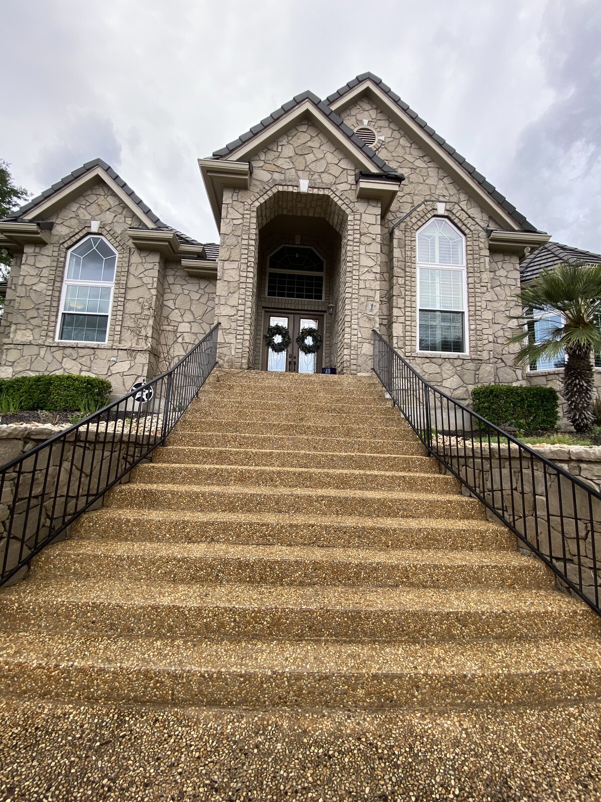 After: cleaned exposed-aggregate stairs